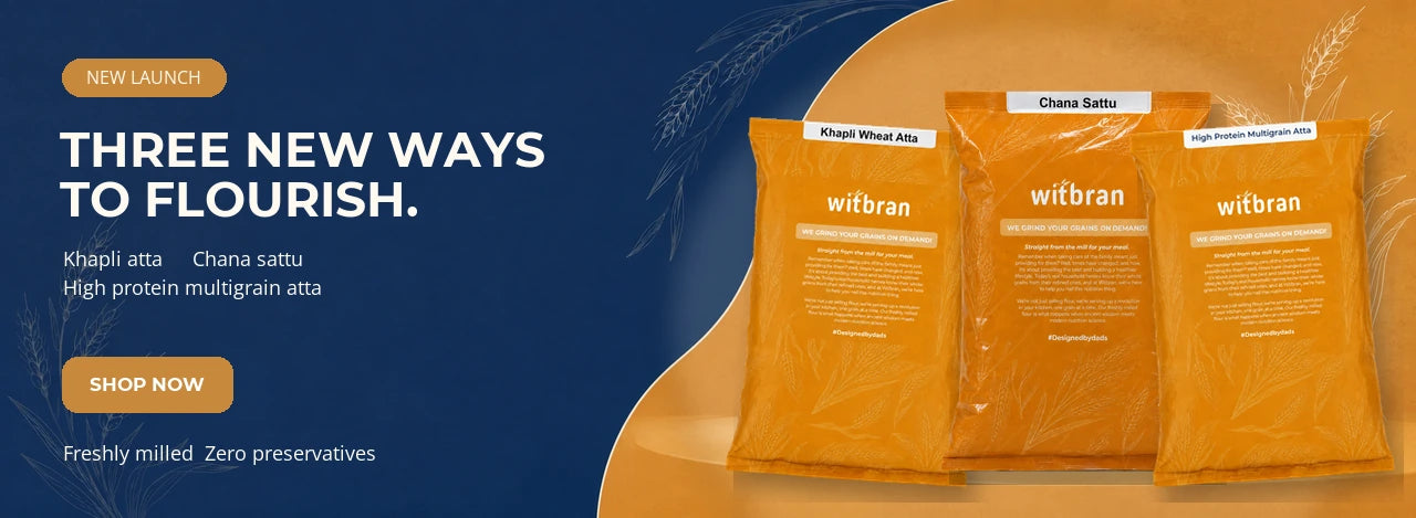 Three orange bags of witbran flour products displayed on a dark blue and orange promotional background with text reading 'THREE NEW WAYS TO FLOURISH' and 'SHOP NOW'.